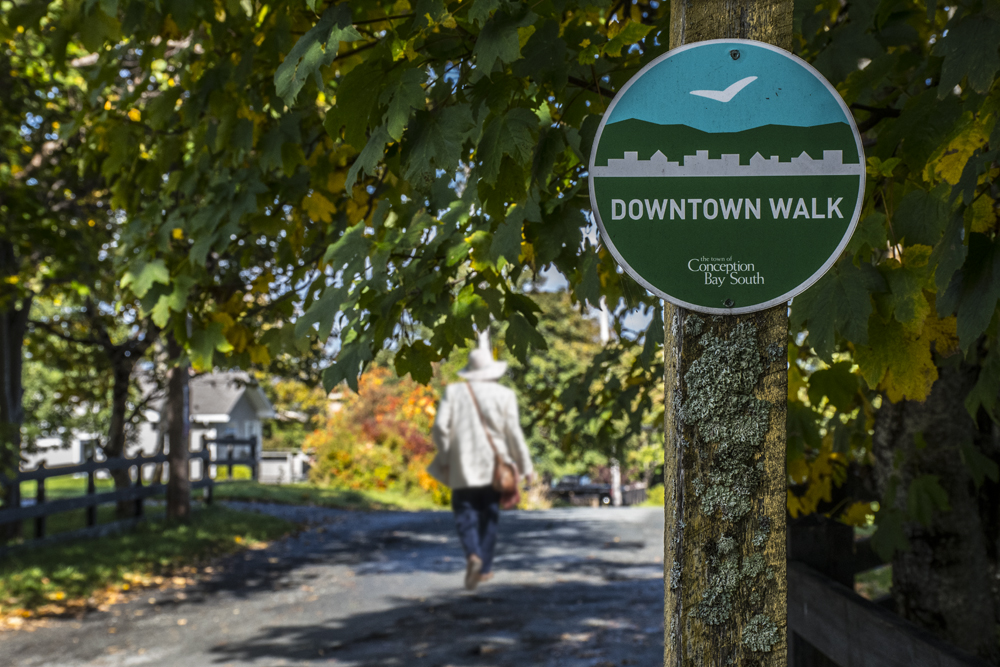 Downtown CBS walk fall senior lady