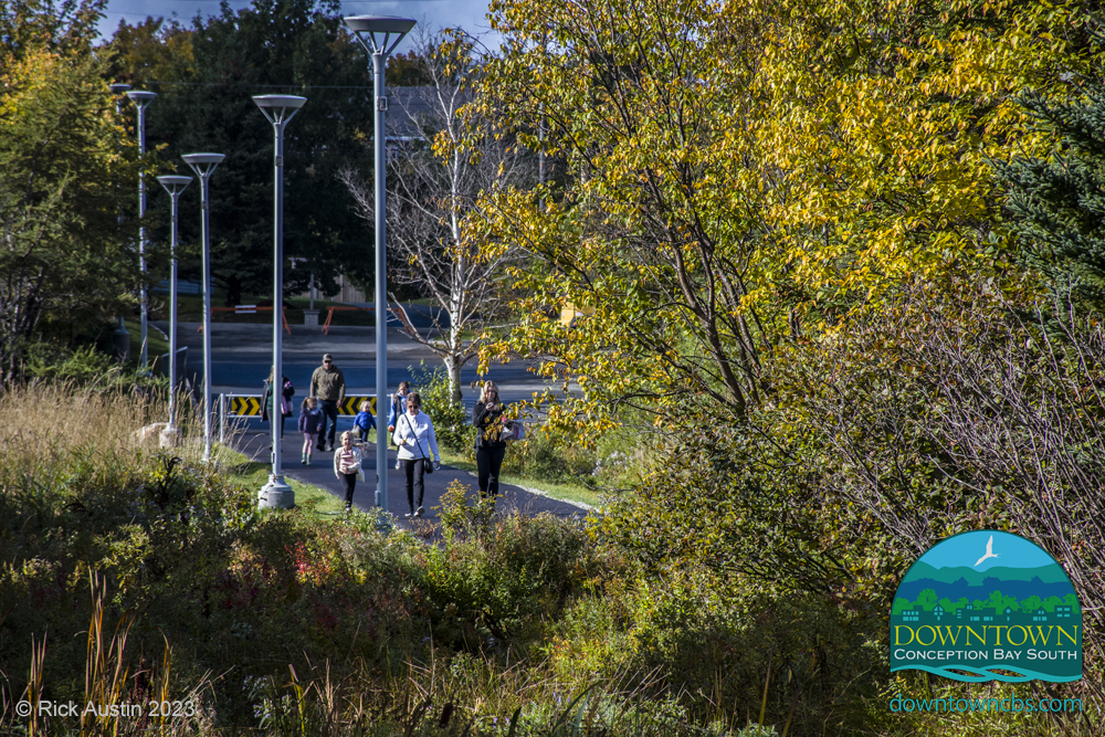 Family walking to playground. Community Park, Conception Bay South.